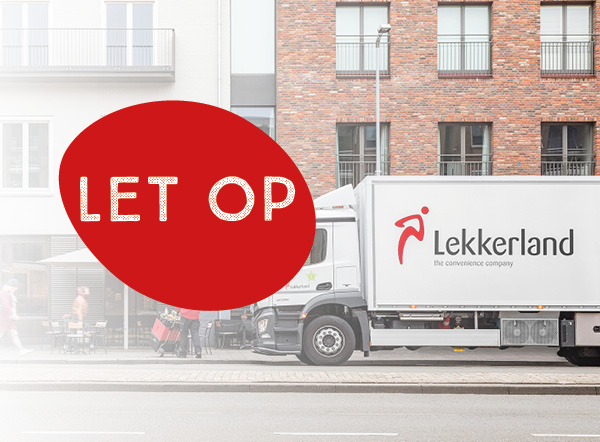 Lekkerland vrachtwagen met let op bol in rood